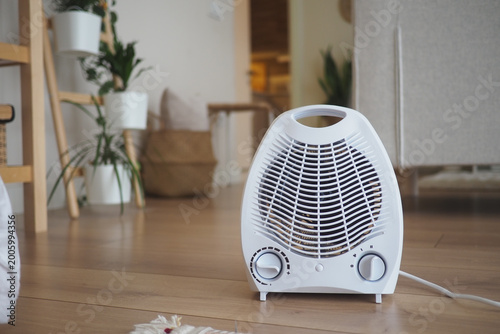 Electric heater in a cozy room for warm air