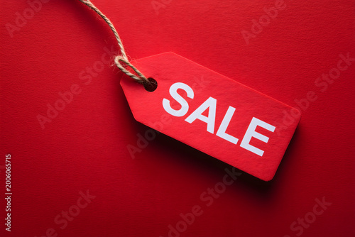 A vibrant red price tag for retail promotions and seasonal discount sales