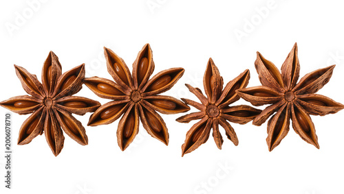 Fényképezés Four star anise spice pods arranged in a row, isolated on transparent background