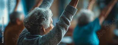 Elderly people stretching in a nursing home during group exercise  