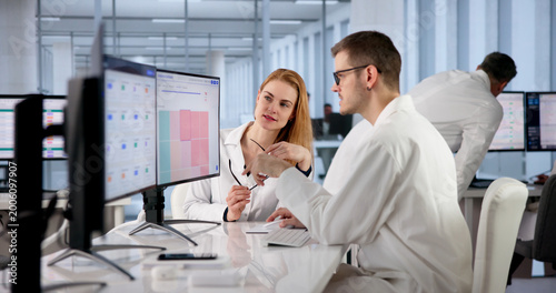 Tableau sur toile Doctor Carefully Analyzes Healthcare Compliance Data