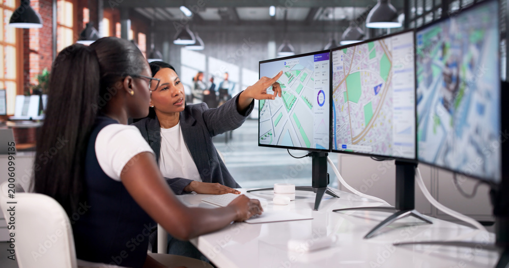 Obraz premium Urban Planner Studies Detailed 3D Land Map