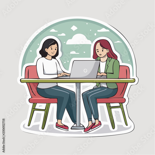 Two women working on a laptop at a table
