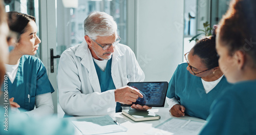 Konstfotografi Doctor, nurse and x ray in meeting with tablet screen, training team or medical research for diagnosis