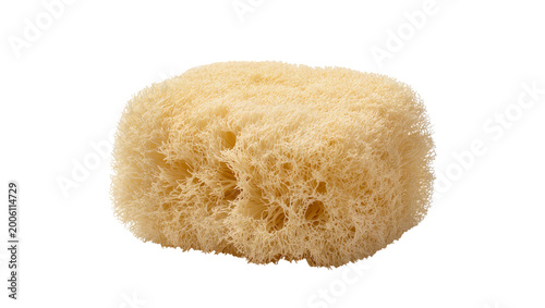 Foto Natural beige loofah sponge with porous texture, isolated on transparent backgro