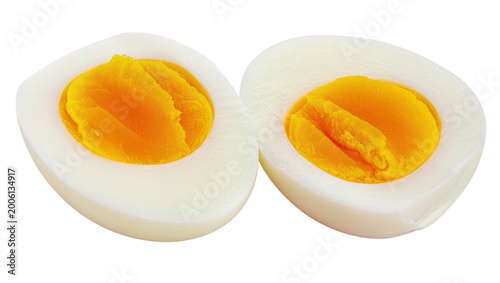Foto Two halves of a hard-boiled egg with bright yellow yolks, isolated on transparen