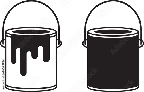 Spilled black paint in a bucket with handle