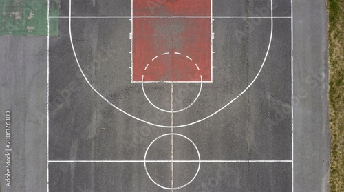 Aerial View of Outdoor Basketball Court with Red Key and Grass