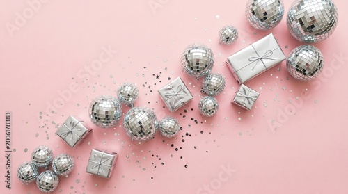 Silver Disco Ball with Dynamic Light Beams Background