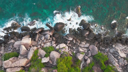 Aerial Top Down View of Rocky Coastline with Ocean Waves Ko Tao Thailand