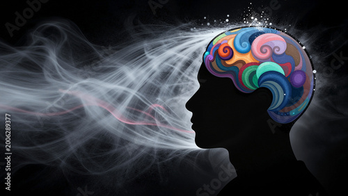 Silhouette of a head with an abstract brain with colorful and swirling threads, human mind representing thoughts, emotions and creativity. Foggy process of thinking, dreaming, passing of time.