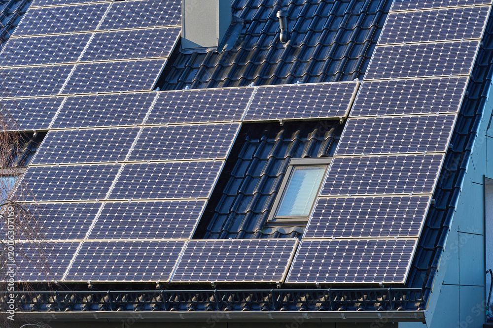 Fototapeta premium Shiny solar rooftops