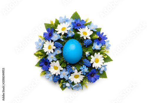 Blue easter egg in a wreath of white and blue flowers isolated on white background