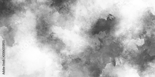 Konstfotografi Dramatic black smoke and cloud formation, bizarre forms of white powder explosion cloud against black background, cement wall modern style background and texture