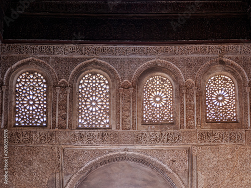 Ornate Moorish Stone Lattice Windows and Carved Islamic Arch Interior With Geometric Motifs, Alhambra, Granada