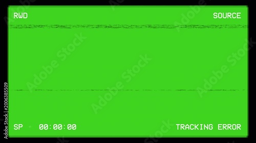 Analog VHS rewind screen with tracking error, subtle glitch noise, distortion for overlay. Vintage VHS tracking error screen with frame and glitch effect. Camcorder tracking error playback screen. 4K