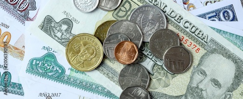Konstfotografi Cuban peso money bills and coins on table