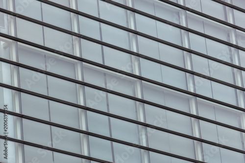 Glass facade pattern of modern building exterior