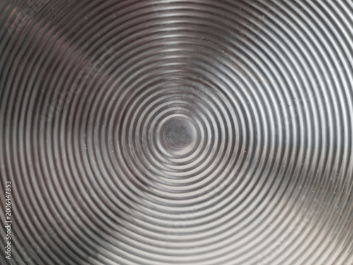 Metal texture surface shows concentric rings