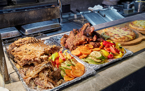 Obraz na plátně Teppanyaki grilled meat station at a high-end star-rated hotel buffet