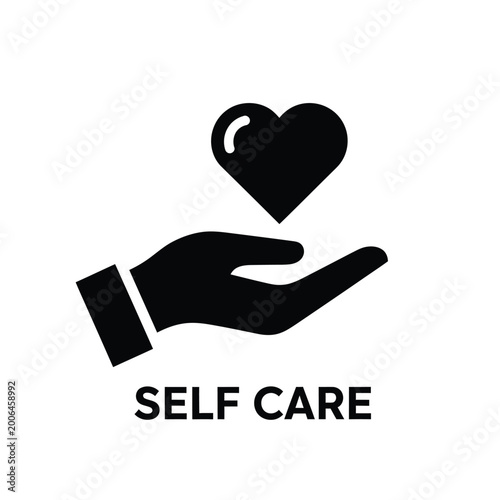 heart in hand icon a black silhouette representing love care and self compassion on white background high quality professional detailed modern