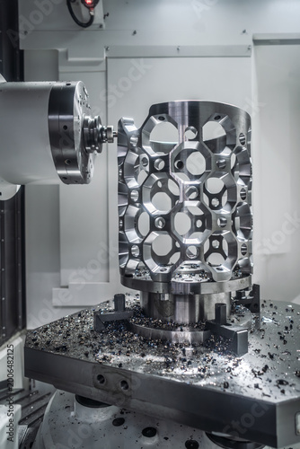 CNC milling machine processing an aluminum aerospace part.
