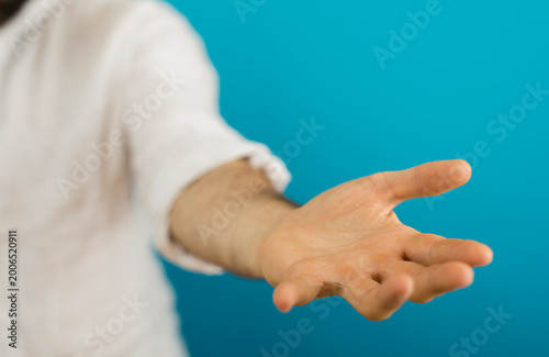 Hand reaching out, offering...