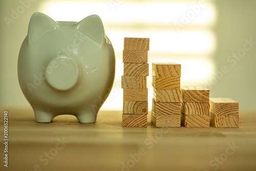 Piggy bank and falling wood...