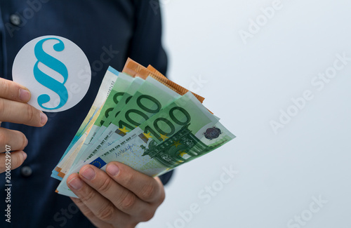 Image depicting a person with euro banknotes and a legal symbol, suitable for financial and legal co