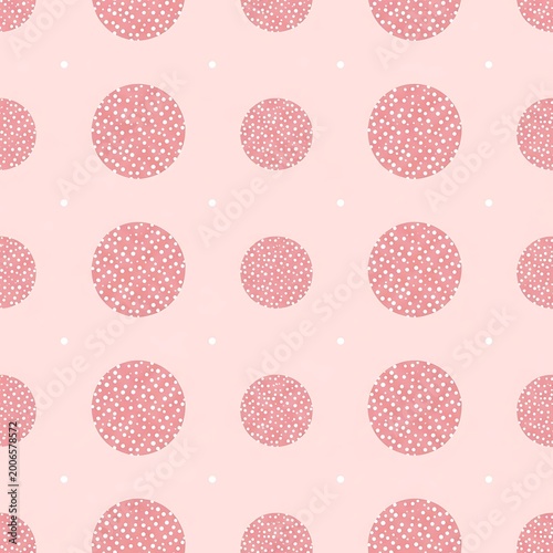 Seamless pattern of pink polka dots with small white dots, abstract floral design