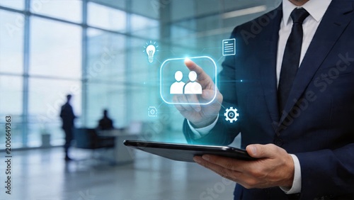Businessman using tablet with digital interface for human resources team modern office technology corporate management concept virtual icons overlay recruitment software system