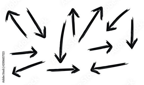 Tableau sur toile Set of hand-drawn brushstroke arrows indicating different directions and paths i