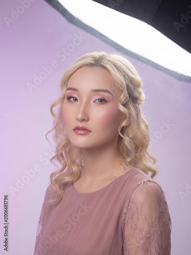 Portrait of girl in dusty pink dress
