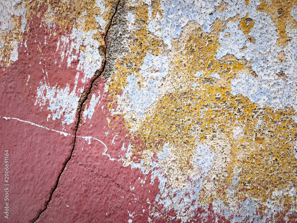 Fototapeta premium Distressed Grunge Wall with Peeling Layers of Old Paint