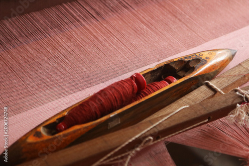 Canvas Print Handloom Shuttle on a loom.