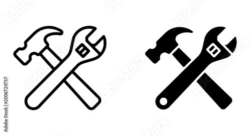 Black and white line icons of crossed hammer and wrench tools