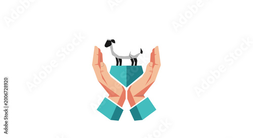 Fotografia Hands holding a black and white goat.