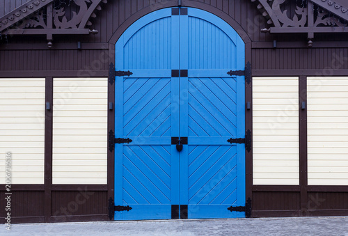 A large, tall wooden door that looks like a gate