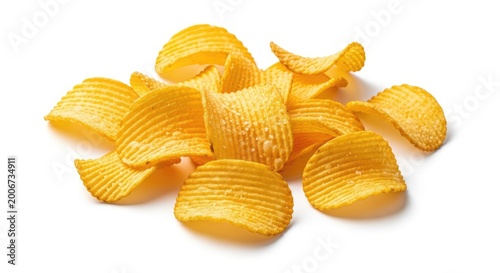 A pile of golden, wavy potato chips scattered on a plain white background. The ridges are crisp and salty, looking delicious and crunchy, gourmet, fried, golden