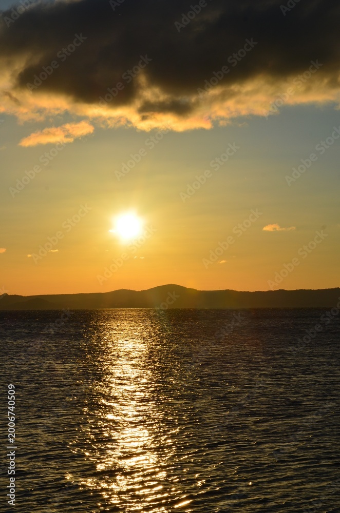 Fototapeta premium Sunset on Bolsena lake. Viterbo, Lazio. Italy