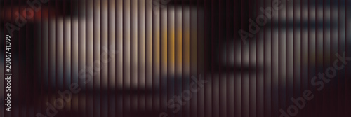 Foto a series of vertical brown and black stripes with blurred light effects creating a gradient-like appearance