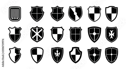 Collection of 20 black and white heraldic shield icons with various designs and patterns on white background