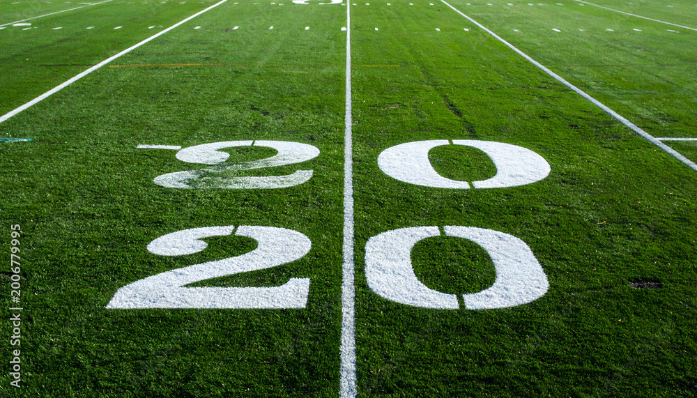 Obraz premium American Football Field Yard Lines Number 20 Close Up.