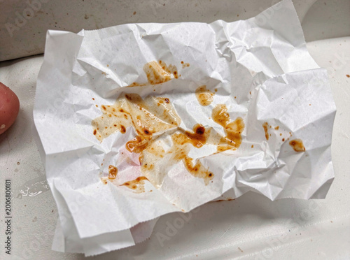 A piece of paper with food residue, suitable for illustrations of messy situations or comic strips
