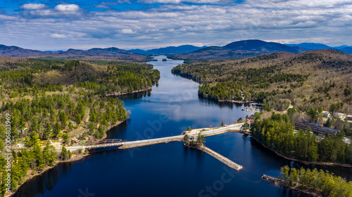 Tablou pe pânză Long Lake, NY, USA  April 29, 2026  Aerial photograph captures the scenic hamlet of Long Lake and Raquette River in the heart of New York's Adirondack Mountains