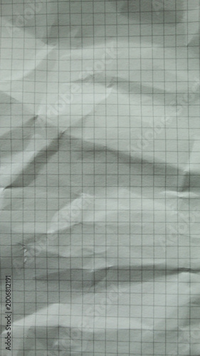 Wrinkled grid paper texture with visible folds, perfect for grunge style, overlays and textured design