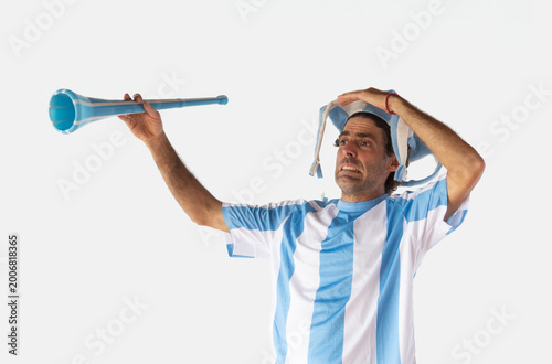 Man wearing an Argentina football jersey