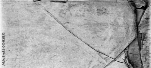 Foto Grungy grey paper texture with diagonal creases and folds appearing like old worn document surface for background design projects and graphic overlays needing antique paper style look and aged feel