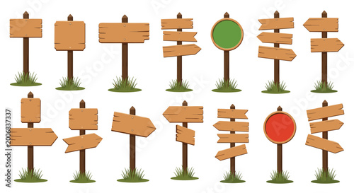 Variety of wooden signboards and arrows on posts standing on green grass patches isolated on a white background for wayfinding.