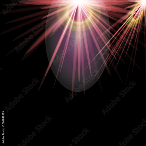 Heart shape with light rays shining through on dark background